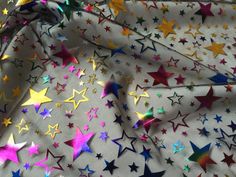Multi Coloured Stars Net Fabric